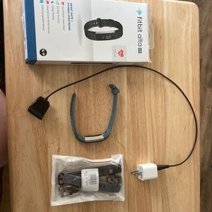 Fitbit Alta HR Small/Petite with charging cord and 3 extra bands.